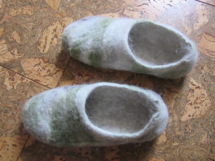 Felted slippers; made with pygora fiber that's removed during the dehairing process.